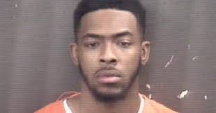 Police arrest Rock Island man accused of robbing Moline woman while armed  with gun