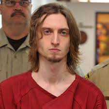 Murder suspect's parents sue city