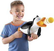 The penguins of madagascar is a tv show on nickelodeon that has 4 penguins and 3 lemurs as the main characters. Amazon Com Fisher Price The Penguins Of Madagascar Rico Launcher Toys Games