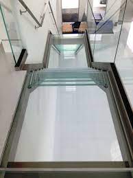 5 Tricks To Design A Glass Floor Walkway Or Bridge Glass Floor Glass Stairs Glass Stairs Design