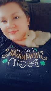 Baby chicken and goose being raised together