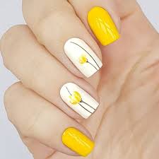 Share them with your friends now! White And Yellow Nail Art Design Miladies Net