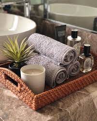 There Are Simple Ways To Spruce Up Your Bathroom Neatly Rolled Up Towels Styled With Candles And Aroma Scents Really Do The Luxury Towels Spa Candle Bathroom