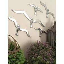 Litton Lane 4 In X 16 In Silver Finish Flock Of Birds Wall Decor In Polished Aluminum 7 Set 22177 The Home Depot In 2020 Bird Wall Decor Decorative Sculpture Bird Decor