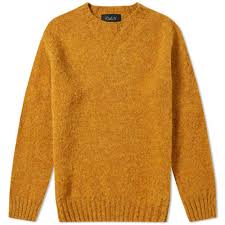 This intricate pattern features stylised stars, diamonds, arrows and waterbug motifs in a palette that echoes the white and grey bark of aspen trees against a blue sky. Howlin Birth Of The Cool Crew Knit Howlin By Morrison