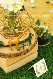 Animal candles can be both accents and favors. Modern Rustic Safari Birthday Party Kara S Party Ideas Safari Birthday Party Gold Safari Baby Shower Safari Birthday