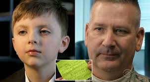 Myles Eckert and Lt. Col. Frank Dailey. Myles "paid it forward" giving a  $20 bill he had found to Dailey at a Cracker Barrel in Toledo, OH, in honor  of his dad