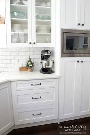 White shaker cabinets like the dayton (shown above) offer sleek style while opening up this kitchen's space. 47 Hardware Ideas Hardware Pocket Door Hardware Black Cabinets