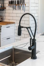 Artesso single handle articulating kitchen faucet 63225lf brizo. Brizo 63121lf Bl Matte Black Solna 1 8 Gpm Pre Rinse Pull Down Kitchen Faucet With Dual Jointed Articulating Arm Magnetic Docking Spray Head And Finished Hose Faucetdirect Com