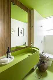 A combination of pink and green creates an entertaining and beautiful bathroom for girls. Photo 13 Of 15 In A Marble Chopping Block Door Opens Up To Reveal A Sophisticated Brazilian Apartment Dwell