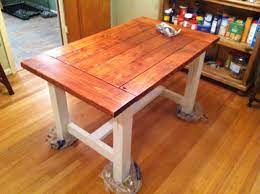 A round, pedestal style kitchen table for four people: Farmhouse Dining Table Kitchen Table Wood Dining Table Farmhouse Dining Table