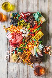 This post contains affiliate links. Halloween Candy Grazing Table Edible Crafts