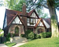 A Guide To Tudor Homes From Storybook Homes To Grand Manors The Tudor Style Will Capture Your Imagination Tudor Style Homes Tudor House House Styles