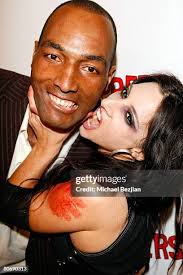 Actor Calvin Green and a zombie model pose at the Triumph Films' Los...  News Photo