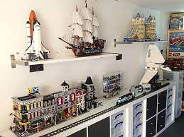 Some of his sets are kept put together, and he displays them on the top of his dresser and on one shelf in his room. Lego Room Project By Atkinsar Lego Room Lego Room Ideas Lego Display