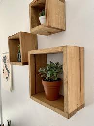 Depending on the type of wood you use, you can create a variety of aesthetics. Wood Floating Cube Shelves Set Of 3 Etsy In 2021 Floating Cube Shelves Cube Shelves Wood Box Shelves