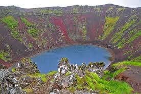 The caldera, 55 m (180 ft) deep and 170 m (560 ft) wide, is composed of a rare red volcanic rock. The Kerio Crater Lake In Iceland Amusing Planet