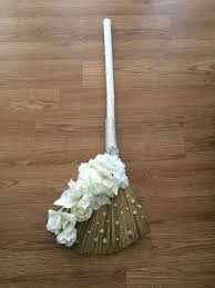 Flowers and decorations should be below eye level so that conversation flows easily. Diy Wedding Broom Wedding Broom Jumping The Broom Cream Wedding