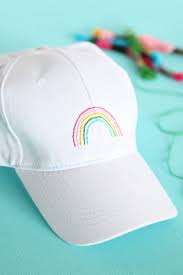 Diy How To Make Your Own Embroidered Rainbow Baseball Cap The Pretty Life Girls Rainbow Hats Embroidery Tutorials Hat Embroidery