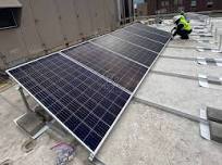 Install Solar Panel Ballast System On A Flat Roof