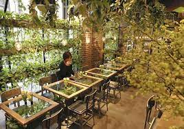 Japanese Cafes Become Urban Forests With Flowers Greenery Cafe Interior Design Flower Cafe Forest Restaurant