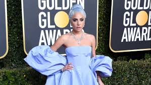 Lady gaga might've made a stellar entrance at the golden globes tonight, but she didn't attend the ceremony alone. Lady Gaga S Golden Globes Dress Stolen Auctioned Brb Gotta Bid Stylecaster