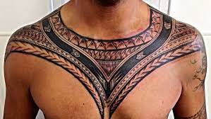 Tribal Chest Tattoo Necklace Like Man Standing In Front Of A White Background Simple Tattoos For Men Samoan Tattoo Tattoos Polynesian Tattoo