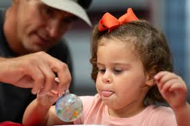 🎉 What a fun time at Christmas in July in the Tracy Gee Community Center!  Residents crafted beautiful ornaments, played games, and enjoyed a festive  movie while sipping hot chocolate and soaking