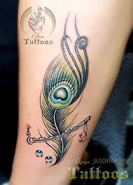 Peacock Feather Tattoo Designs Wrist Flute Tattoo Feather Tattoos