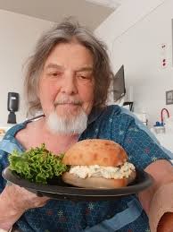 Delicious egg salad sandwich and tomato soup