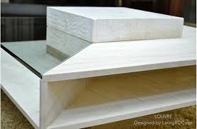 Beautifully simple and sophisticated, its clean elegant lines are handmade of iron and surround an inlay top of solid travertine marble. 100x100cm Square Travertine Marble Coffee Table Louvre