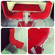 For sale: glass daning table with 2 red leather chair. Price: 40/-BD للبيع:  طاولة طعام زجاج لون احمر مع 2 كراسي جلد بحالة جدا ممتاز… | Decor, Home  decor, Furniture