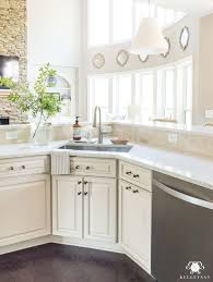 Update And Make A Traditional Cream Kitchen More Modern On A Budget Replacing Kitchen Countertops Cream Cabinets Quartz Kitchen Countertops