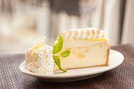 A Delicious Combination Of Sweet And Tart Lemon Meringue Cheesecake Lemon Meringue Cheesecake Cheesecake Factory Delicious Desserts