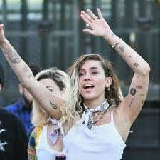 Every single one of miley cyrus's 50 tattoos and their meaning. Pin By Elizabeth Braden On Miley Cyrus Miley Tattoos Miley Cyrus Miley