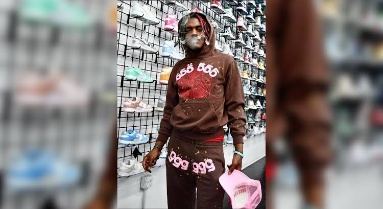 Sp5der 555 Angel Number Hoodie on the street, AI generated