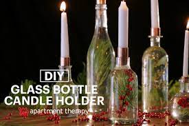 Wine bottle wicks for your bottle oil candles. Project Idea Wine Bottle Candle Holder How To Video Apartment Therapy