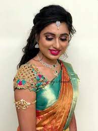 Struggling to find the perfect hairstyle for your wedding? Bridal Portraits Keerthana Looks Ravishing For Her Reception Ceremony Hair And Makeup By Wedding Saree Blouse Designs Bridal Blouse Designs Saree Hairstyles