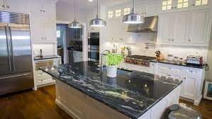 Marble tends to fair better in bathrooms or without the white countertops in this kitchen, the space might seem a bit too dark. Black Granite Countertops Styles Tips Video Infographic