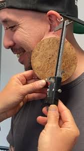 Largest earlobe flesh tunnel (male) 👂 11.48 cm (4.51 in) by Marc Greenleaf  🇺🇸