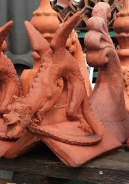 Purely decorative, copper finials help to draw the eye from open, expansive roofs. Dragon Roof Ridge Tile Finials Stone Garden Ornament Theodore Sons Daughters