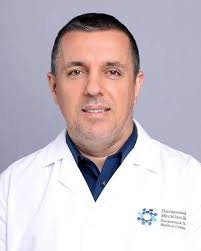 Dr. Andrin Sadikaj, MD