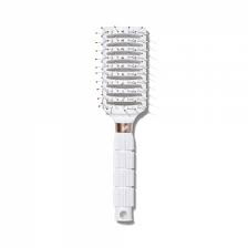 A hairbrush is a handle brush with rigid or soft spokes used in hair care for smoothing, styling, and detangling human hair, or for grooming an animal's fur. Free Flow Dry Vent Hair Brush White T3