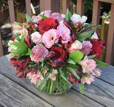 We will forward your order to a local florist. Flower Mix In A Glass Bowl Roses Lisianthus Scabiosa Alstroemeria Hypericum Flower Arrangements Flower Delivery Floral Arrangements
