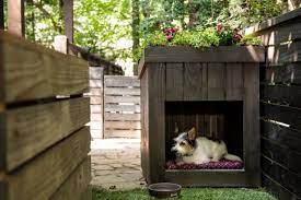 Create Designer Digs For Your Dog Using An Upcycled Pallet Dog House Diy Dog House Plans Diy Dog House Pallets