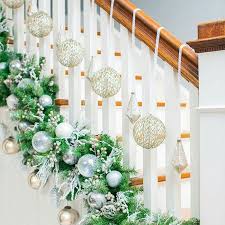 Use Twine To Secure Garland To Bottom Of Stairs Add Ornaments Hang Ornaments Fro Christmas Stairs Decorations Christmas Staircase Decor Diy Christmas Garland