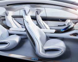 Happy man inside car of his dream. Mercedes Benz Presents A Luxury Electric Car