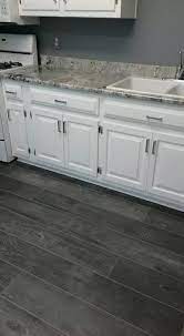 Bar stools are sourced from organic modernism. 80 Alluring Kitchen Floor Ideas You Must Have 2018 Laminate Flooring In Kitchen Grey Kitchen Floor House Flooring