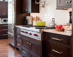 Pin By Chicfetti On Kitchen Ideas Brown Kitchen Cabinets Brown Cabinets Clean Kitchen Cabinets