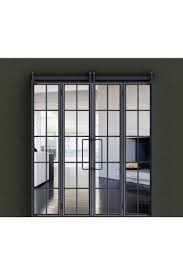 Barn doors are a visually intriguing alternative to more traditional window treatments. Bifolding Barn Door Rustica